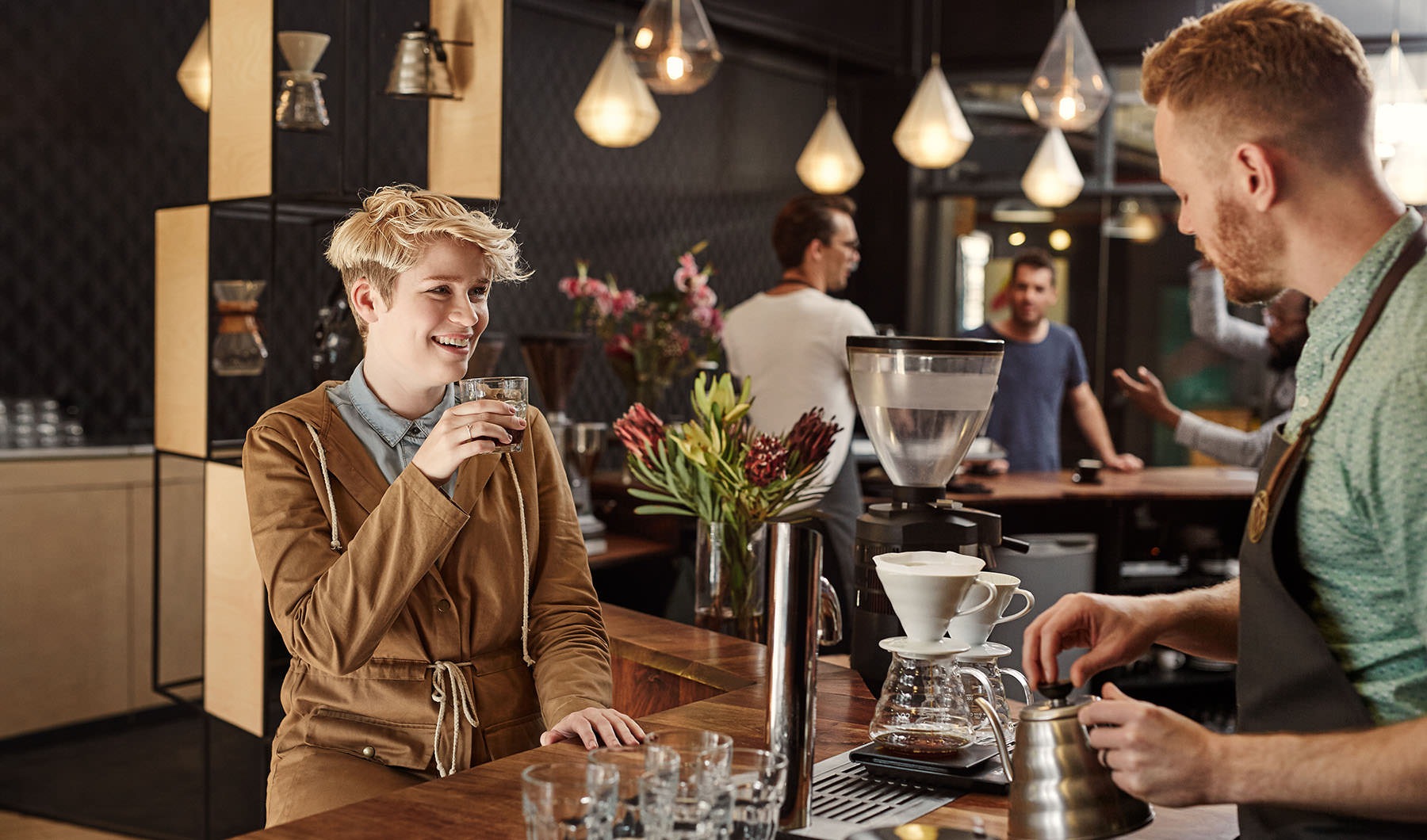 Lifestyle at Fireside Flats Woman at coffee bar
